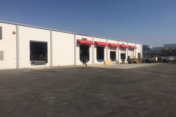 Loading bays with open and shut garage doors